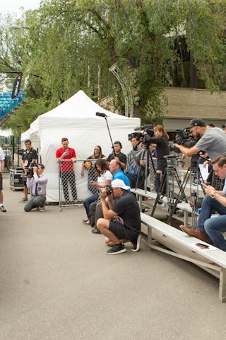 Members of the news media visible with panelists during an opening press conference on July 20, 2018 in Saskatoon, Canada.