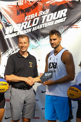 6 Tomo čajič (SLO) - Ljubljana accepts their FIBA 3x3 World Tour Saskatoon award.