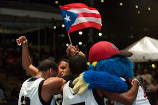 With puerto rican flag and mascot at the San Juan Masters 10-11 August 2013 FIBA 3x3 World Tour, San Juan, Puerto Rico