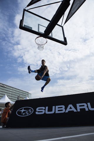 Lipek dunk over Subaru A-Board at the Subaru Dunk contest final at Tokyo Masters 20-21 July 2013